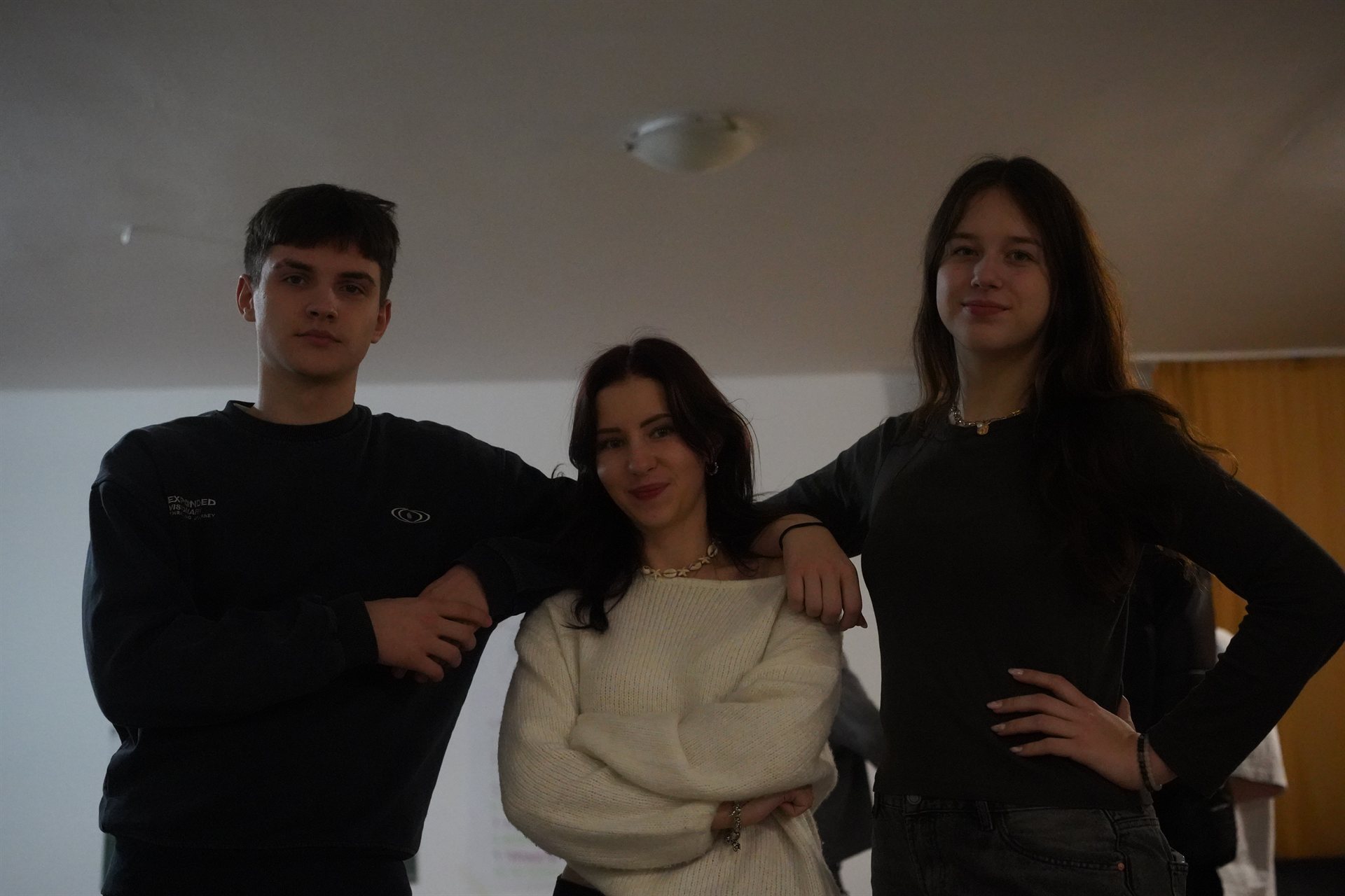 Three friends together during a break