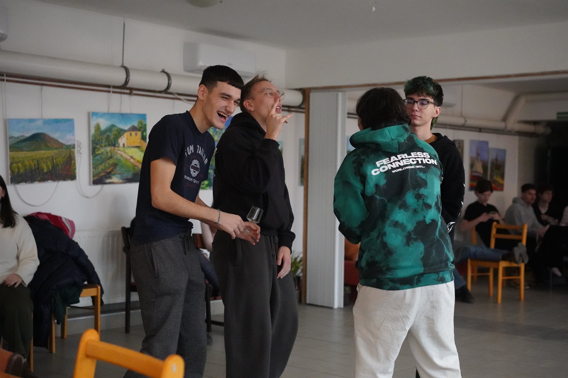 Three participants sharing a laugh