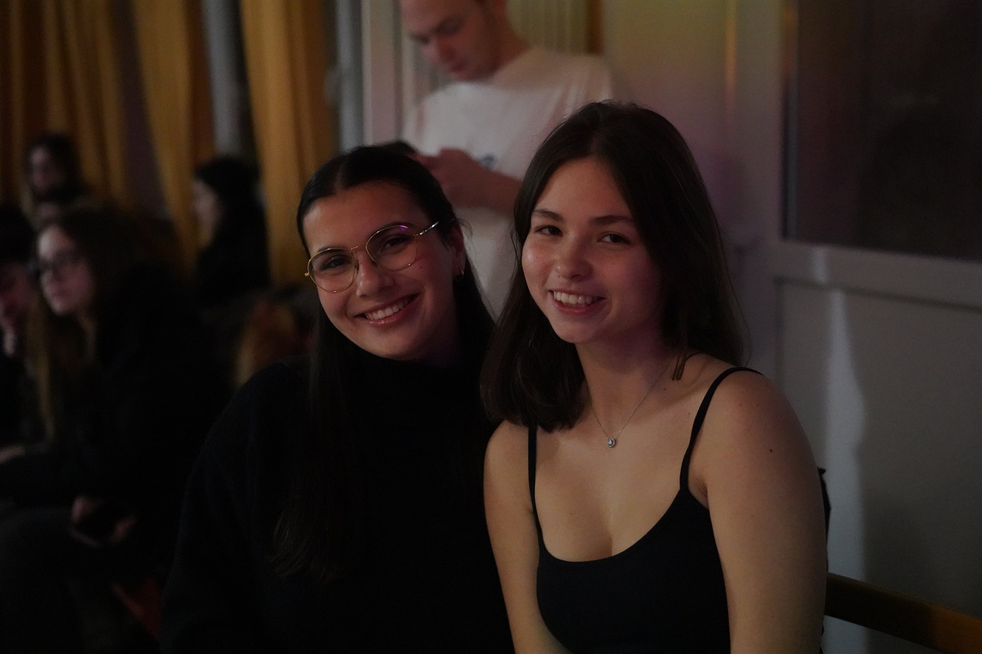 Two participants smiling together