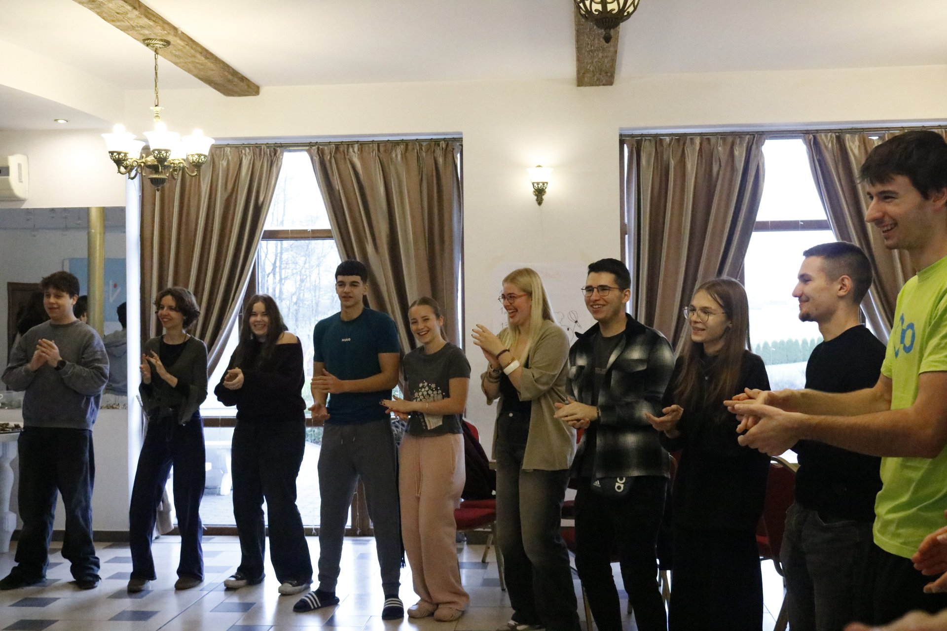 Participants gathered in a circle for a group exercise