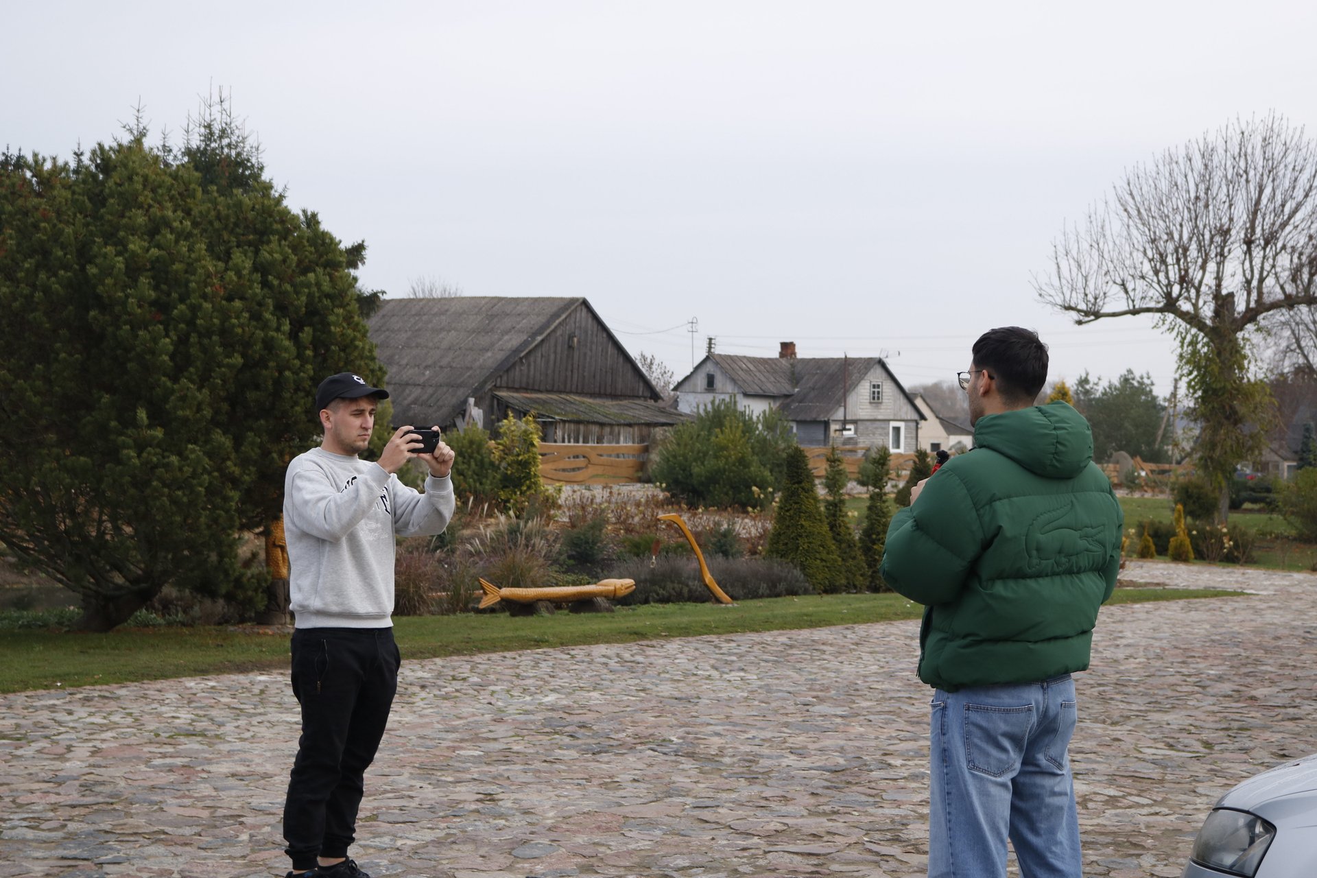 Filming a segment outdoors near the venue