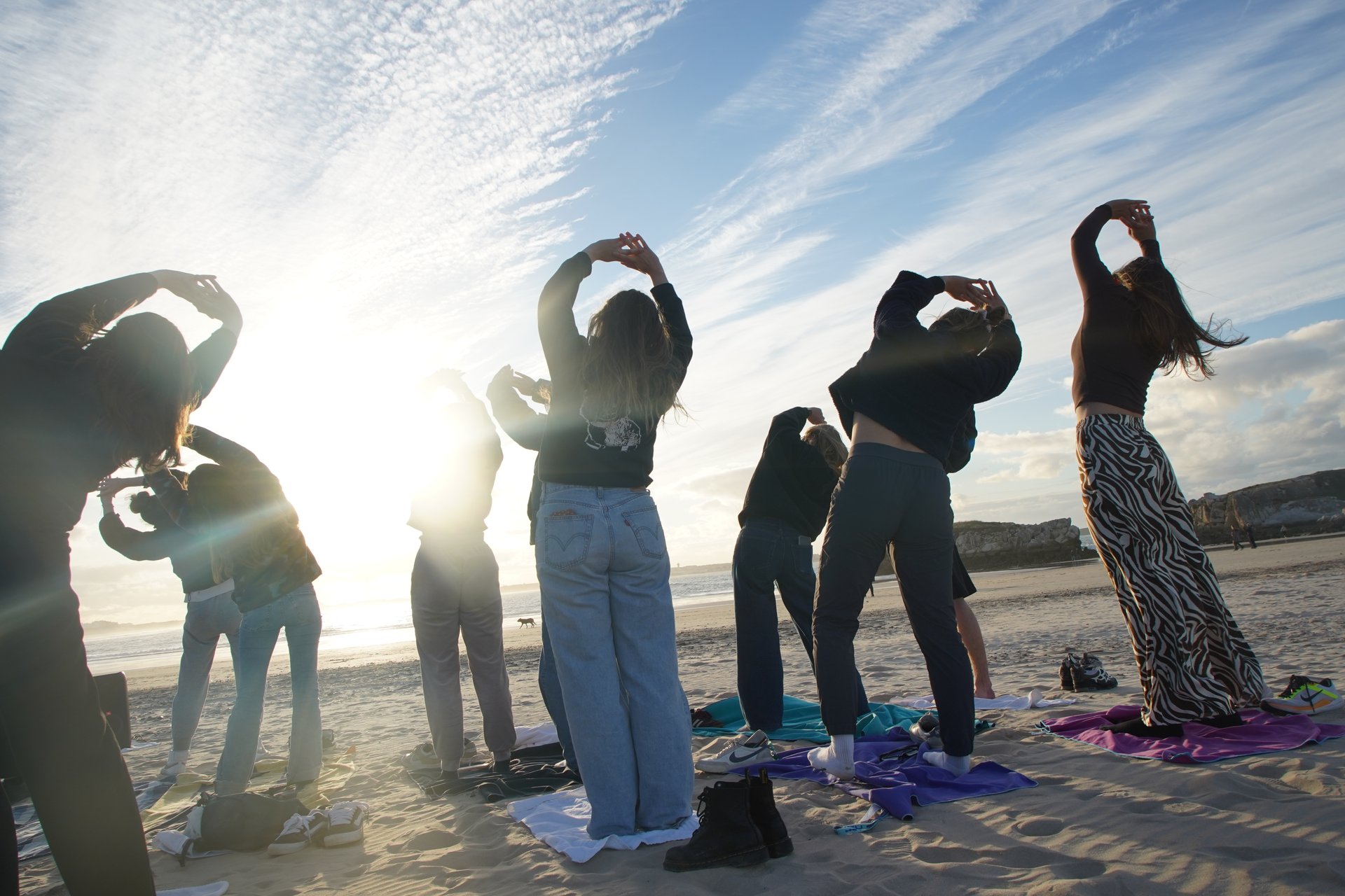The yoga and meditation session on the sand